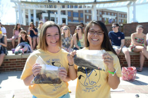 Stephanie Berardi and Jessica Houston show off their hair donations.