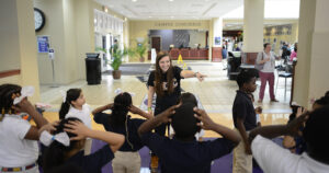 Sophomore Lydia Profili leads Montlieu students in a game of Simon Says.