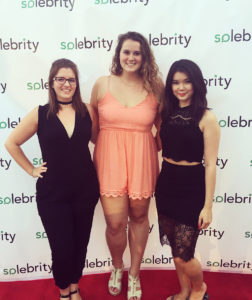 Kirstie Pratt (center) poses for a photo with fellow interns Michele Byers (left) and Angela Pathammavong (right) at a DC Swim Week red carpet event held at the Penthouse Pool and Lounge in Washington, D.C. 