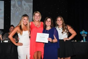 From left to right, sorority members Kristen Kukla, Caylee Henderson, Natalie Yingling and Emily Anderson accept the Crown Chapter award at the ZTA international convention.