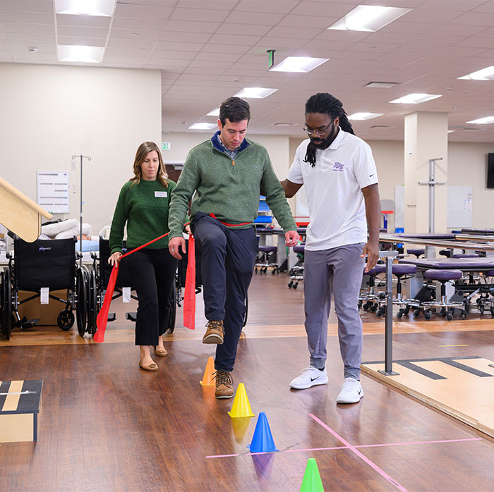 students doing physical therapy