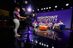 A group of High Point University students film a show inside HPU's new TV studio inside the Nido R. Qubein School of Communication.