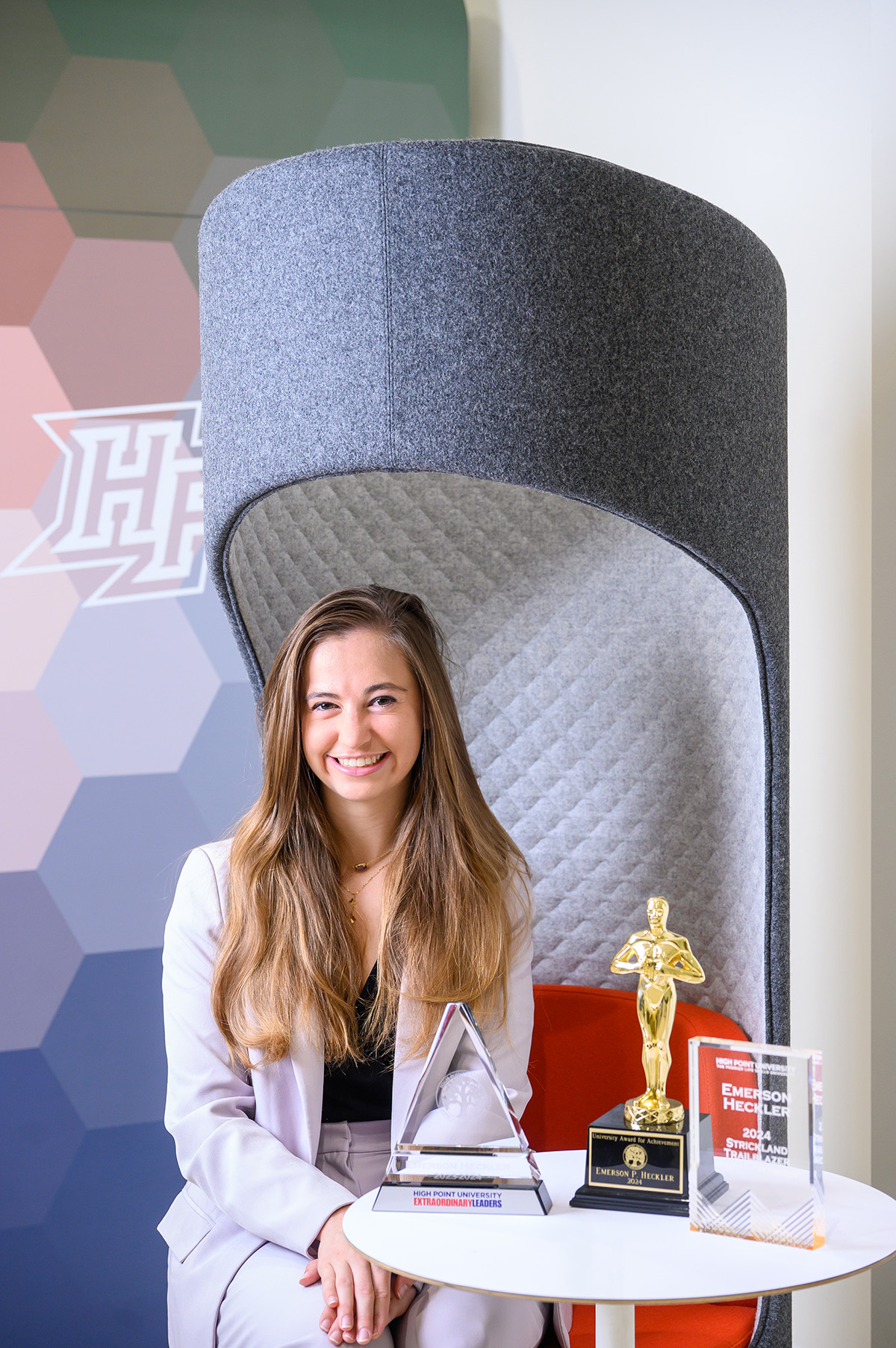 Emerson Heckler is pictured in the WSNS HIve with awards, including the 2024 Strickland Women’s Trailblazer Award, recognizing her leadership in a predominately male-dominated field and her passion for serving others.