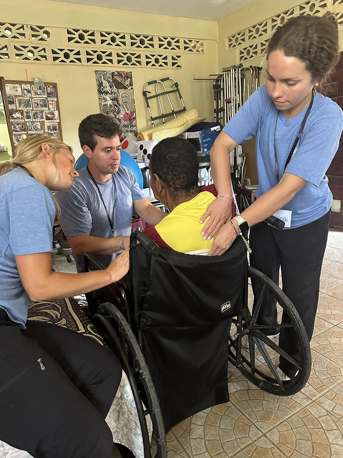 HPU PT students Mackenzie Peacock, left, Adam Nunez and Haleigh Scott provide patient care during their trip to Belize.