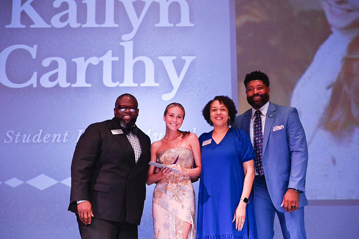Robert Tillman, left, is pictured with 2023-2024 Student Impact Award winner Kailyn McCarthy, Drye-Dancy and McMichael.