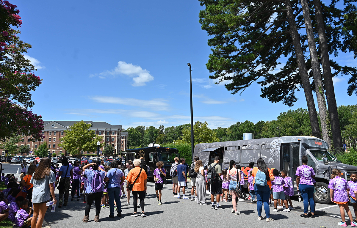 HPU provided complimentary food trucks and a DJ playing music for the children after they received their new bikes.