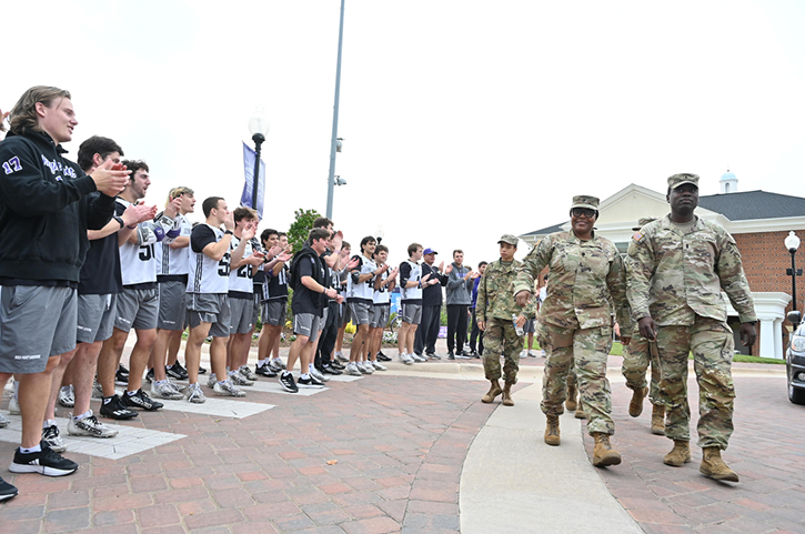 As is tradition, HPU students will honor veterans with a celebratory welcome as they arrive at the arena for the event. 