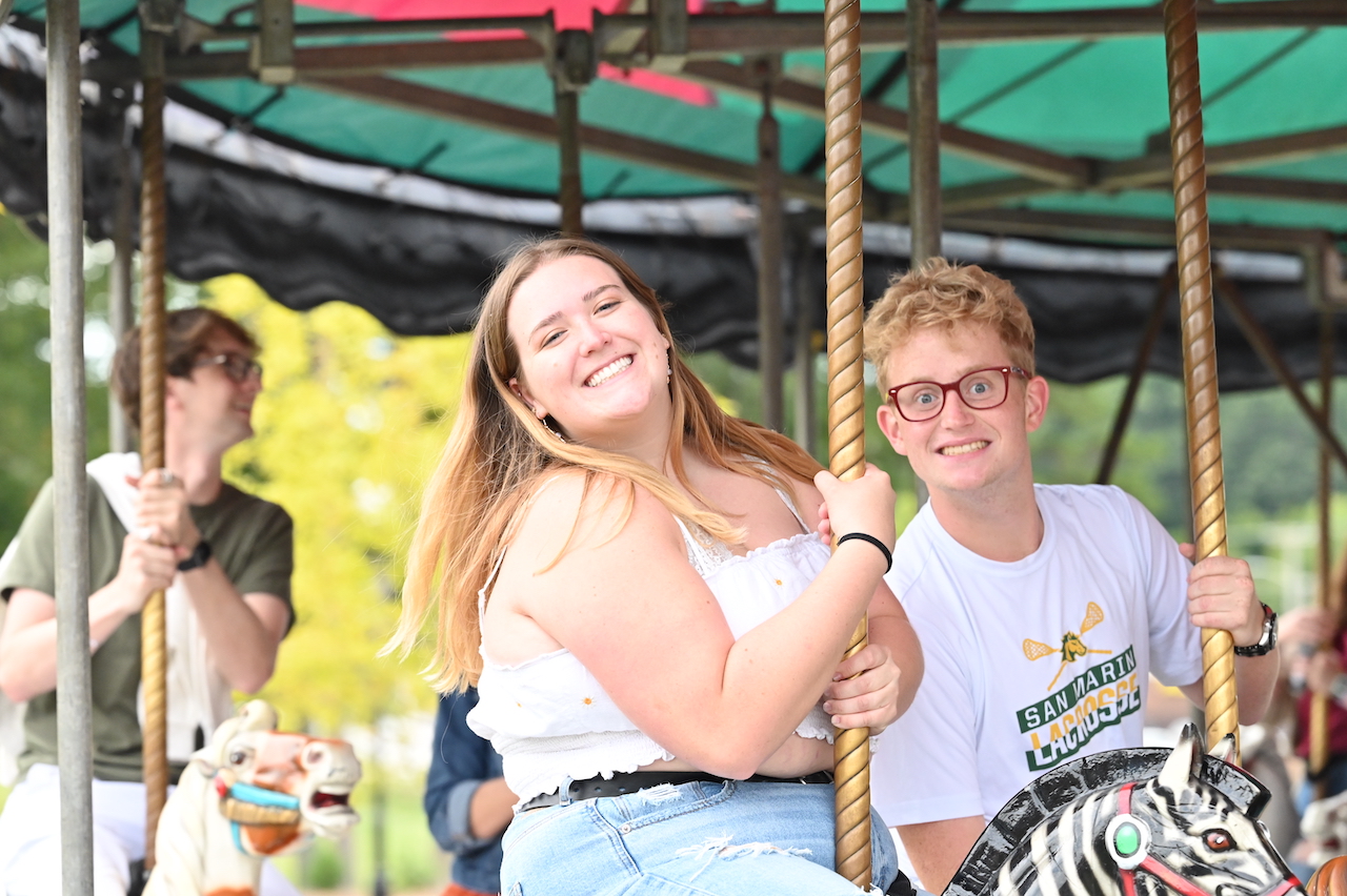 Students on Carousel