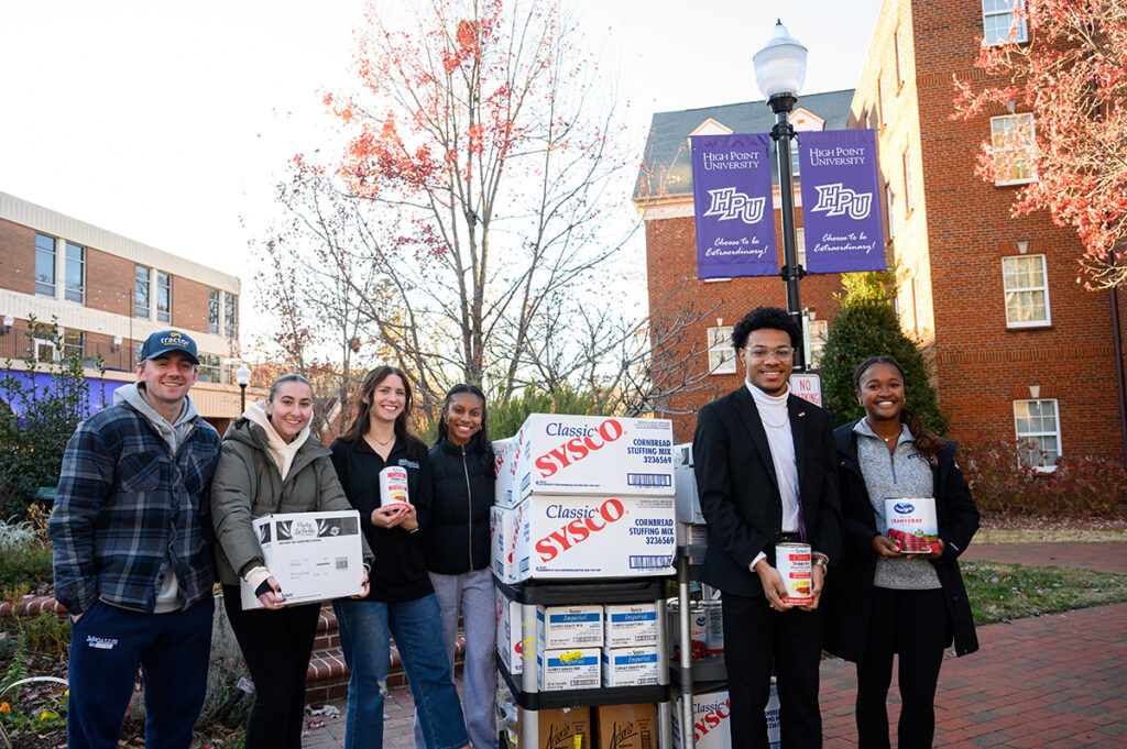 High Point University’s Student Government Association donated nearly 500 meals to Open Door Ministries, a nonprofit that provides food for people in need and operates a shelter for homeless men. Pictured from left are SGA members Ben Niehaus, Mai Mishan, Halle Nichols, Ja’Niyah Williams, Michael Rozier and Hannah Parson with food they were delivering to Open Door Ministries.