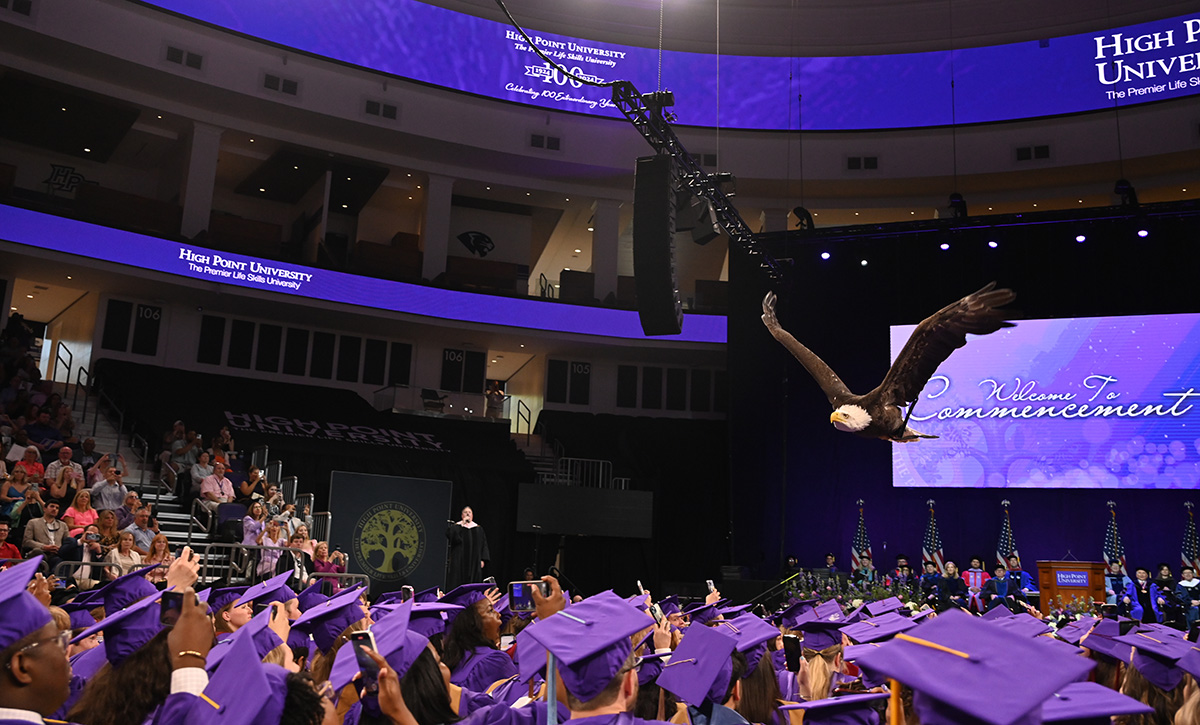 As is tradition, Clark the bald eagle soared over the graduates at the end of the ceremony to symbolize the ideals of free enterprise, independence and the ability to pursue new opportunities in America.