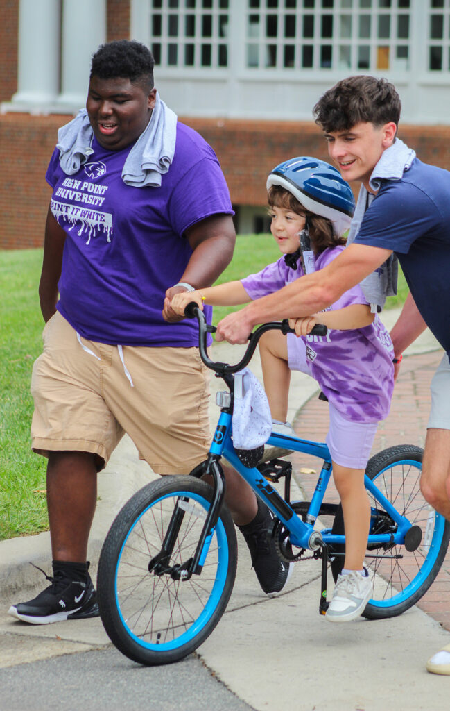 Throughout the event, HPU students spent time with members of the community and local children. Free food trucks were also available.