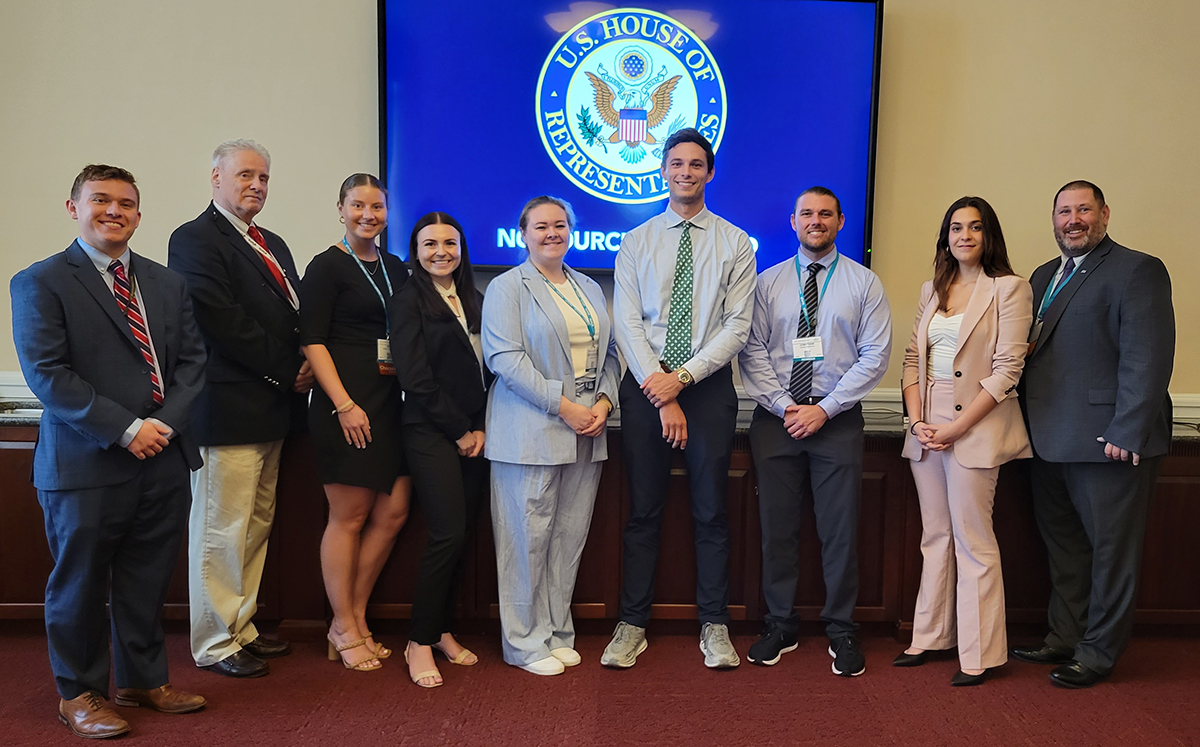 Pictured from left are Dalton Lucas, HPU political science alumnus and staff member for Rep. Kathy Manning; Russell Mabry; HPU Class of ’24 Department of Physical Therapy students Jessica Stempowski, Zoe Festa-Woods, Theresa Eggleston, Justin Martino and Jonathan Burton; Fabiana Corsi Mendez and Dr. Lance Mabry.