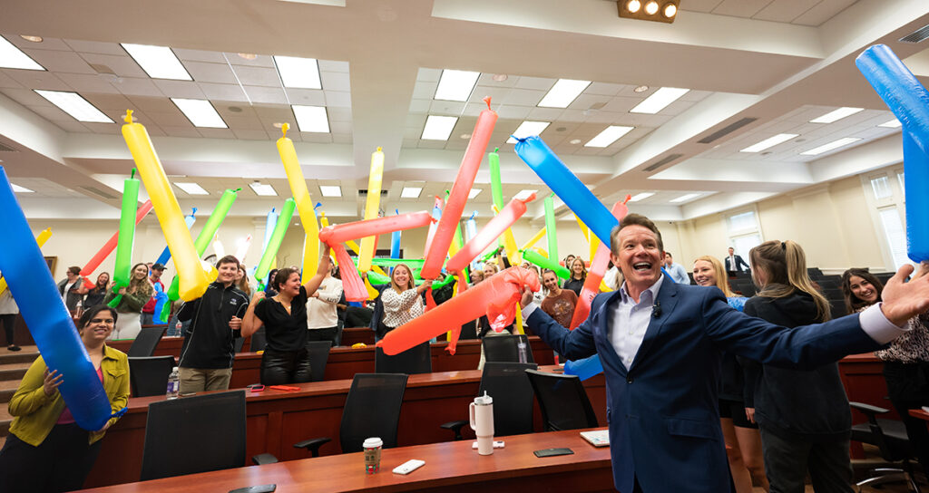 HPU Educator in Residence Steve Spangler leads Stout School of Education students in a STEM lesson to inflate huge balloons during a visit to campus.