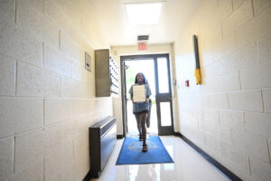 High Point University Student Government Association President Hannah Parson carried a stack of boxed meals into the Guilford County Sheriff’s Office to thank personnel for their service and sacrifice.