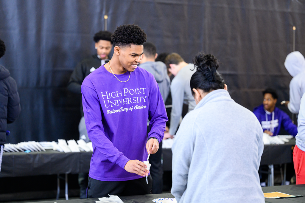 HPU MLK Day of Service students help with packing thousands of seeds