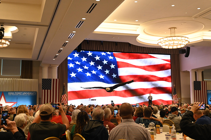 The program included Clark, a bald eagle that soared above the audience as the HPU Chamber Singers sang “America the Beautiful.” 