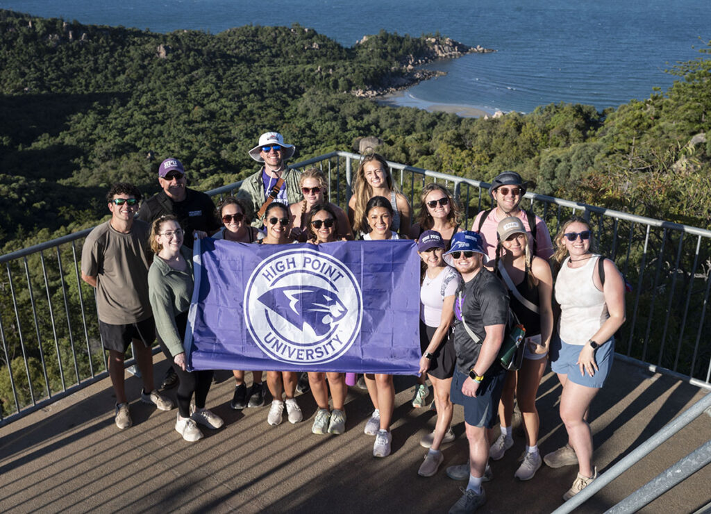 HPU communications students overlooking the beach in Townsville, Australia.