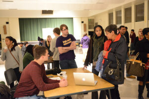 Students from High Point University and Penn-Griffin School for the Arts share the beginnings of their research on William Penn, the city’s black high school before desegregation, at a fall community event.
