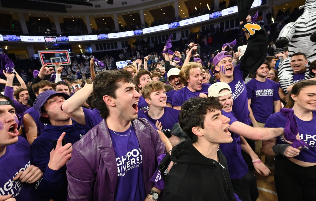 students cheering at hpu espnu basketball game